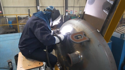 Manual welding of nozzles